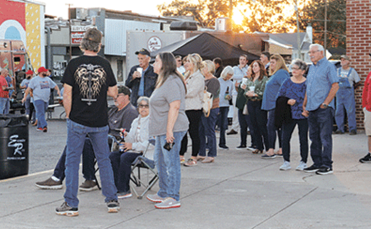 The second Fall into Downtown was held at 2nd Street and Walnut Avenue on Thursday. The crowd was building by sunset as the Grammy-winning Lost Bayou Ramblers performed.  Later, Three Thirty Seven would take the stage to a packed downtown. (Photos by Harlan Kirgan)