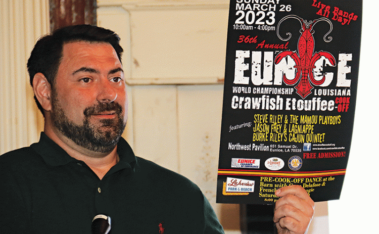 Jacob Bergeron, Eunice Rotary Club president, holds a poster for the World Championship Crawfish Etouffee Cook-Off scheduled 10 a.m. to 4 p.m. March 26 at the Northwest Community Center pavilion in Eunice. (Photo by Harlan Kirgan)
