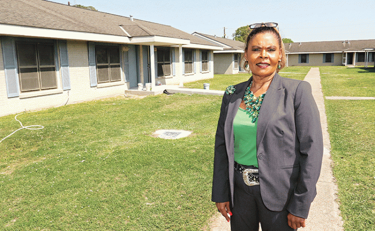 Angelia Guillory, executive director of the Eunice Housing Authority, is shown at the Acadian Village site. (Photo by Harlan Kirgan)