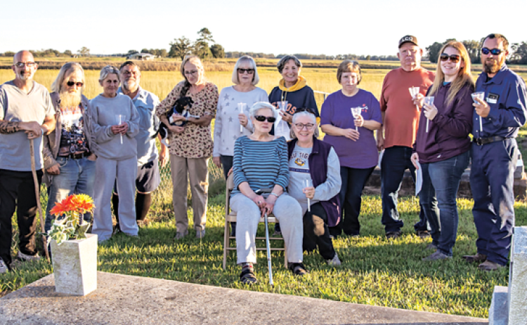 A candle-lighting ceremony was held at the Langley Cemetery to remember and pray for loved ones on Saturday. Many ancestors of the surrounding communities including Eunice, Basile, Iota, Crowley, Elton, Jennings are buried in the cemetery. The cemetery is located off of La. 97 (Evangeline Highway) on Fernest Road, in the northwest corner of Acadia parish. Langley Cemetery is non-profit and open to all who need a final resting place. Seated, from left, are Seated Sue Richard and Helena Putman. Standing, from