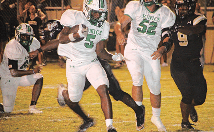 Bobcat runner Thaddeus Godfrey carries against Leesville. (Photo by Rhett Manuel)