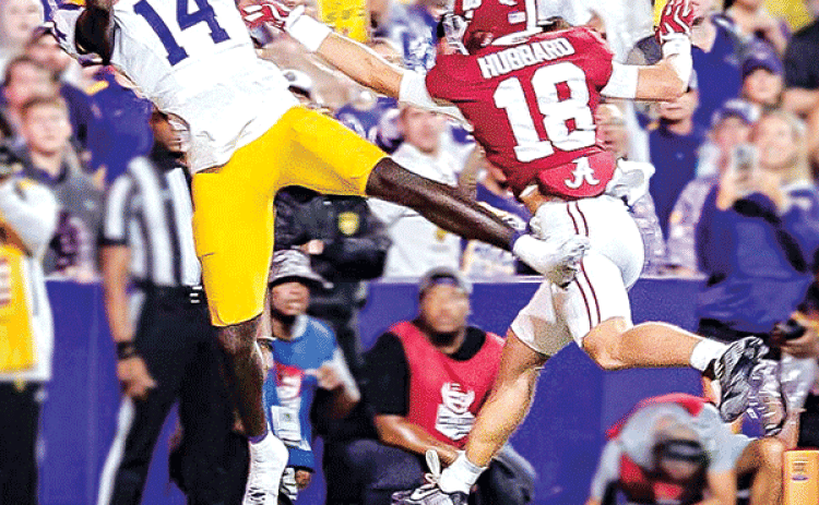 LSU’s Trey’Dez Green snags a pass against Alabama. (Photos by Dwight Jodon)