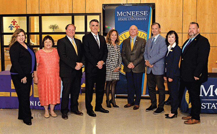 From left, are Angela Sonnier, LSUE director of radiologic technology; Dr. Mae Simoneaux, LSUE director of nursing; Todd Dozier, LSUE dean of arts and sciences; Dr. John Hamlin, LSUE vice chancellor of academic affairs; Dr. Nancee Sorenson, LSUE chancellor; Dr. Daryl Burckel, McNeese State president; Dr. Chip LeMeiux, McNeese provost and vice president for academic affairs and enrollment management; Dr. Suming “Sherry” Bai, dean of McNeese College of Business; and Greg Bradley, McNeese director of radiologi