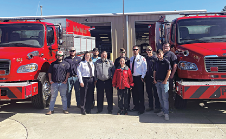 Attending a dedication for two new fire trucks in Fire District 6 on Sunday, from left, were  Karson Brown, Dylan Frey, Phyllis Vail, Jason Garrido, Thomas Vail, Elizabeth LaFleur, Gaige Miller, Chaise Brown, Dylan Fontenot, Cameron Vail and Devin Gaspard. (Submitted photo)