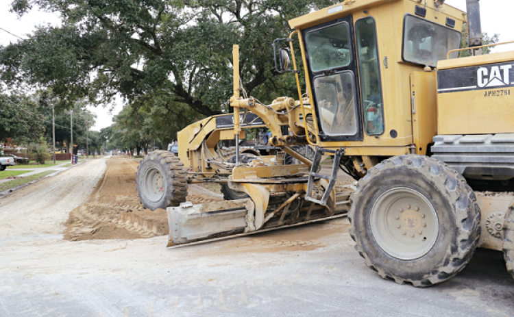 A grader works on Park Avenue at its intersection with Jake Street on Thursday. The work is part of the city’s bi-annual street improvement program. Mayor Scott Fontenot said the Park Avenue work is extensive, but there have been no setbacks to the plan. (Photo by Harlan Kirgan)