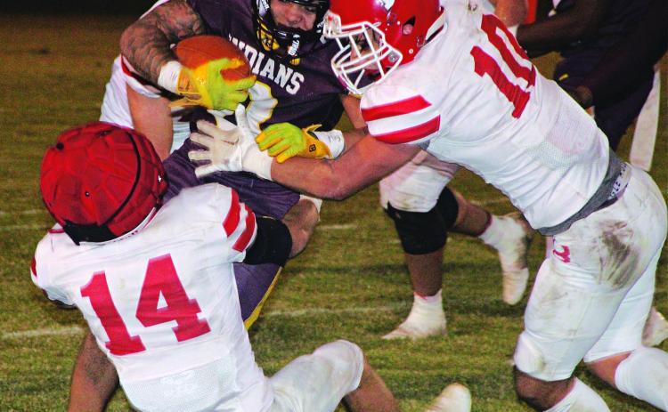 Basile Bearcats stop an Elton runner in a playoff game Friday. Elton won 22-18. (Photo by Rhett Manuel)