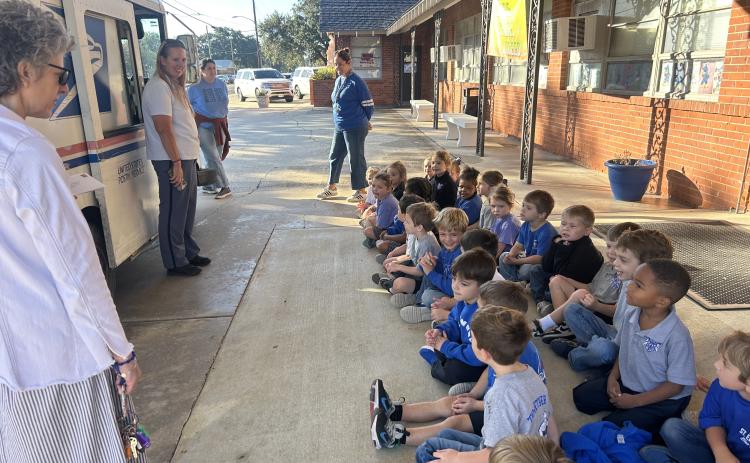 St. Edmund Catholic School Pre-K4 students had a great time learning about community helpers recently. Postal Service letter carriers were on campus showing students how important mail carriers are in our community.