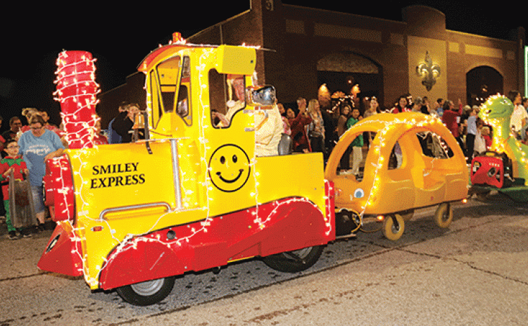 Former Mayor Kenneth Peart’s Smiley Express brightens the 2021 Eunice Christmas Parade. The parade is scheduled on Dec. 15 (Photo by Harlan Kirgan)