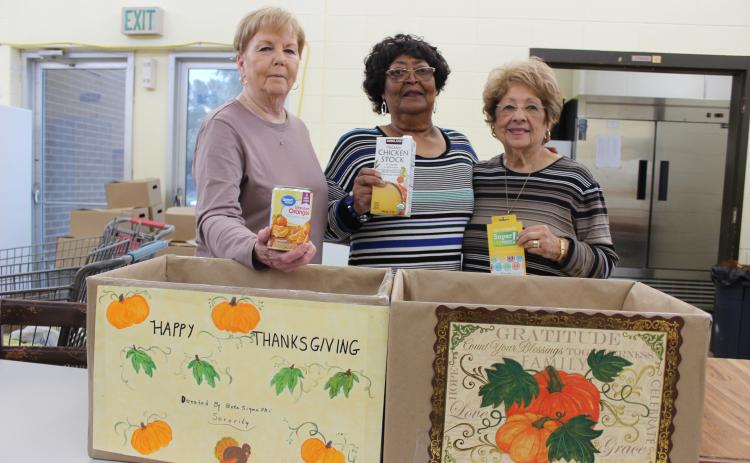 Beta Sigma Phi Sorority gave two boxes of a variety of food items and a  Super 1 Foods gift card to the Eunice Food Bank. A drawing for the gift card was held and name pulled and the winner is Deanna  Poullard.