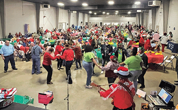 About 450 people attended the Christmas Triad session organized by the St. Landry Parish Sheriff’s Office and held at the Yambilee Building in Opelousas on Dec. 7. (Submitted photo)