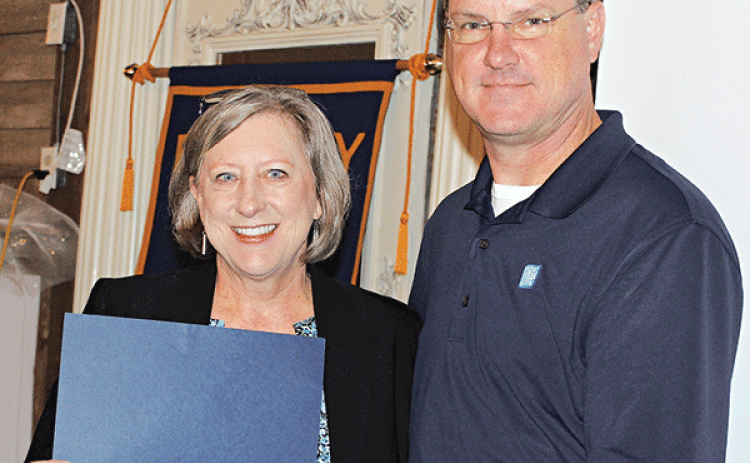 Jerrie LeDoux, congressional aide to Congressman Mike Johnson, was at the Eunice Rotary Club meeting Wednesday to present a Certificate of Congressional Recognition to Dwight Jodon for his achievement and accomplishment  of composing and writing the lyrics to LSUE’s fight song and alma mater. (Photo by Myra Miller)