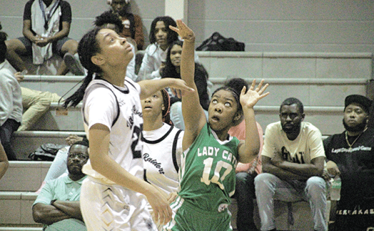 By Rhett Manuel Sports Editor It was a tough night for Eunice basketball in the opening night of the St. Landry Parish Tournament, as both the girls and boys teams suffered losses and moved into the loser’s brackets in their individual fields. Northwest 50, Lady Cats 20 Eunice High School’s girls’ basketball team suffered a tough loss to the Northwest Lady Raiders on Tuesday night, falling by a score of 50-20. The Lady Cats started the game strong, tying the score at 5-5 after Simone Laws knocked down a sho