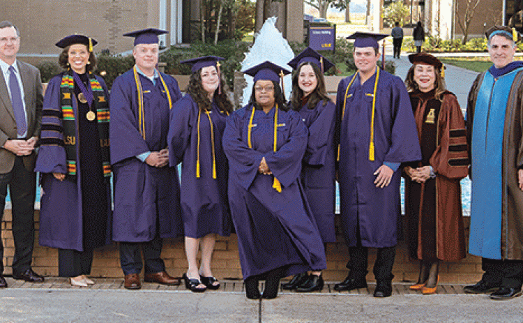 Graduating Summa Cum Laude honors with a grade point average of 3.8 to 4.0 are, from left, Tyler Thibodeaux, Haley Marie Harrison Lange, Wilda Agnus Boutte, Maria Diane Gallent-Smilie, Adam Scott Dore.  The graduates are pictured with, from left, Dwight Jodon, Chancellor’s Medal recipient; Valencia Sarpy Jones, LSU Board of Supervisors chairperson; Dr. Nancee Sorenson, LSU Eunice chancellor; Dr. John Hamlin, vice chancellor of Academic Affairs. (Photos courtesy of LSUE)