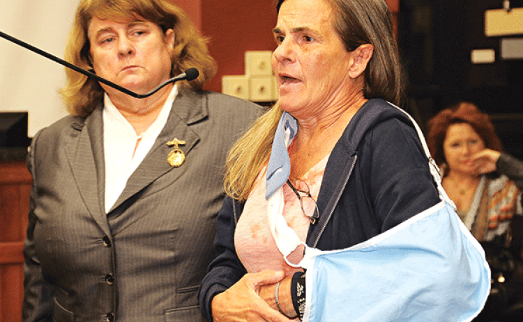 From left, attorney Brigette Piattoly and Michelle Benoit at Wednesday’s St. Landry Parish Council meeting. (Photo by Harlan Kirgan)