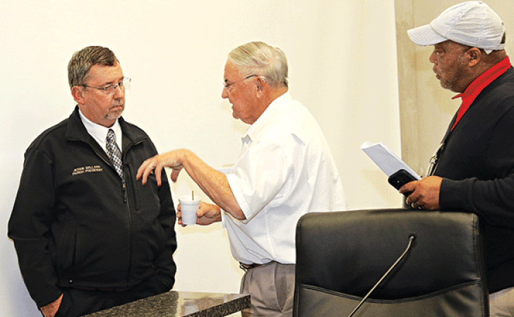 After the special St. Landry Parish Council meeting Wednesday night, from left, Parish President Jesse Bellard, and Council members Harold Taylor and Jerry Red. (Photo by Harlan Kirgan)