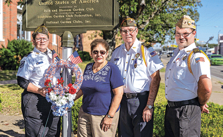 Christy Chatagnier, chaplain of Post 8971,  Donna Baltakis vice president Bulb and Blossom Garden Club of Eunice, James Sonnier, of  Post 8971, and Paul Ganucheau, honor guard captain of Post 8971. (Photo by David Simpson)