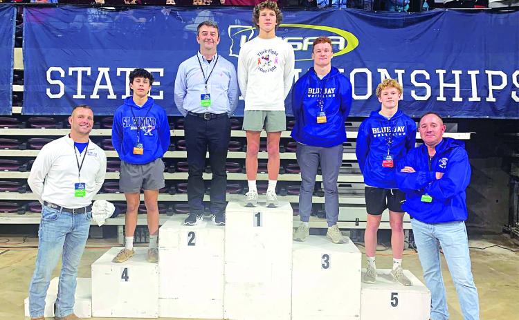 St Edmund wrestlers traveled to Shreveport to compete for the High School State Championship in each their respective classes over the weekend. Four wrestlers from St Edmund placed.  Michael Perron placed fourth at 120 lbs, Cooper Berzas is the state champion at 126 lbs. Wesley Reed took fifth place in the 132 lbs weight class. Henry Summerlin took home third place in state in the 175 lb. weight class. The Blue Jay Wrestling Team placed seventh out of 29 teams at the State Championship Tournament. Pictured