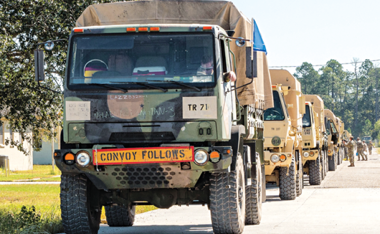 Nearly 70 Louisiana National Guardsmen assigned to the 1087th Transportation Company, 165th Combat Sustainment and Support Brigade, 139th Regional Support Group, prepare roughly 30 tactical vehicles to assist emergency operations in Florida after Hurricane Ian, Slidell, Sept. 29. (U.S. Army National Guard photo by Staff Sgt. Garrett Dipuma)
