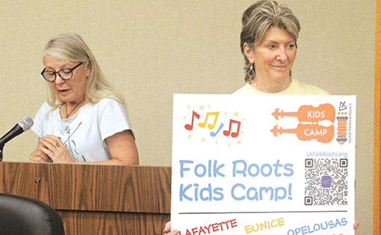 Jeanie Solis, left, executive director of Louisiana Folk Roots, aand Jean Johnson, a Folk Roots Board member, announced a summer Folk Roots Kids Camp in July at LSUE. (Photo by Harlan Kirgan)