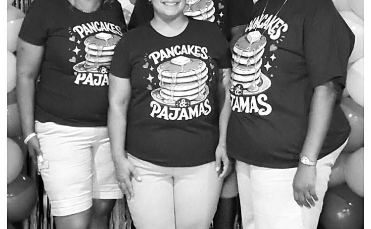 Group posing for Pancakes & Pajamas
