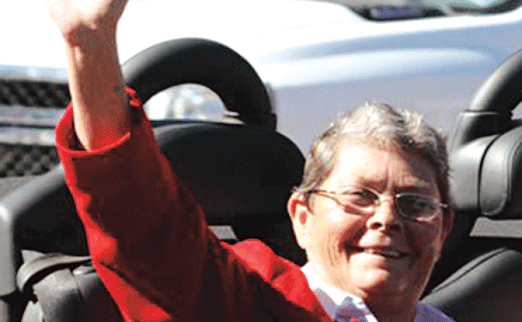 Berline Boone waves to the crowd during the 2014 La. Swine Festival Parade.