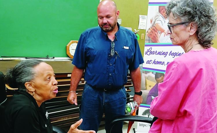 Board members Hazel Sias, Robert Gautreaux and Mary Ellen Donatto.