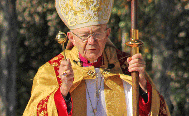 Bishop J. Douglas Deshotel of the Diocese of Lafayette blesses the three copies of the Acts of the Cause for the canonization of Charlene Marie Richard, “The Little Cajun Saint,” during a ceremony at St. Edward Church in Richard on Saturday. Two of the three copies will be delivered by hand to the Dicastery for the Causes of Saints directly across from Saint Peter’s Basilica in Rome, and the original will remain sealed in the archives of the Diocese of Lafayette. (Photo by Claudette Olivier/Crowley Post-Si