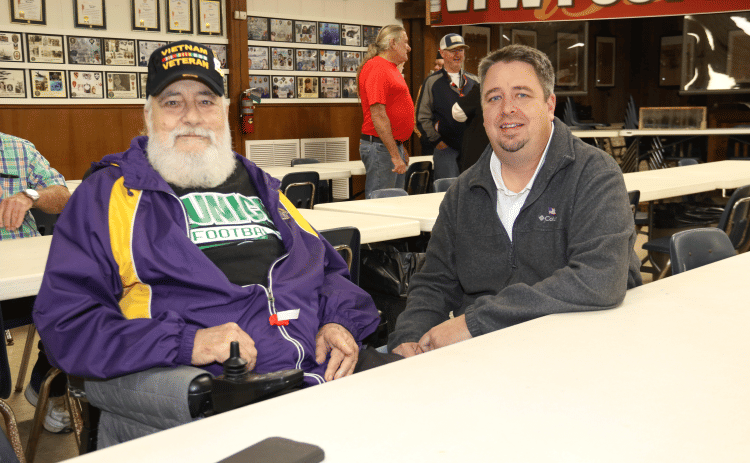 Former Police Chief Gary "Goose" Fontenot and his son, Mayor Scott Fontenot, at the Veterans Day ceremony this year at the VFW Post 8971.  (Photo by Harlan Kirgan)