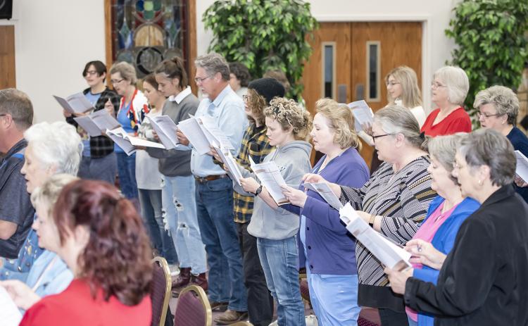 The choir rehearses recently. (Photo by Dwight Jodon)