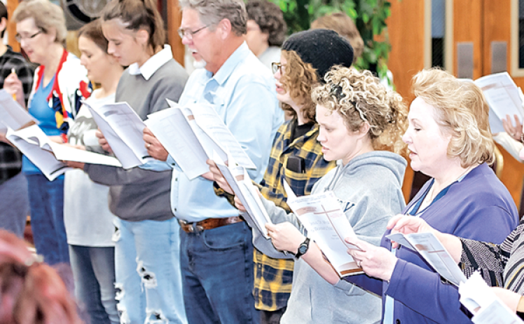 Choir members rehearse at First Baptist Church in preparation for the Eunice Community Concert Band and Choir Christmas Concerts scheduled at 7 p.m. Dec. 9 and 10 at the church. (Photo by Dwight Jodon)