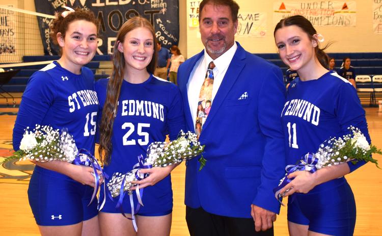 From left, are Julia Zaunbrecher, Ellie Manuel, head coach Barry Manuel and Laura Warner. (Photo by Tom Dodge)