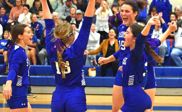 The Lady Jays celebrate the playoff victory.