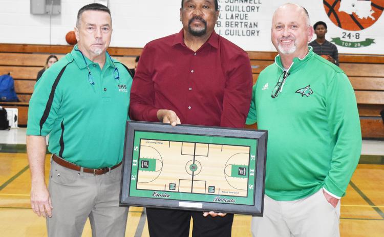 Eunice High honored long-time Bobcats’ basketball coach Robert Trent in a ceremony to place his name on the court. From left, are EHS principal Mitch Fontenot, Trent and athletic director Scott Phillips. (Photo by Tom Dodge)
