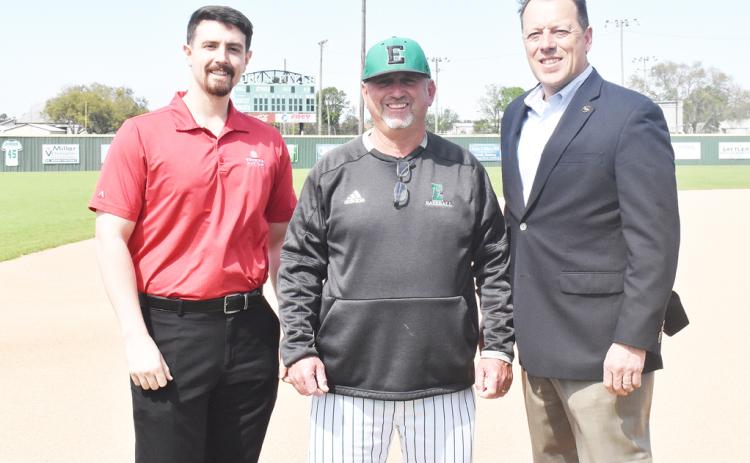 From left, are Caleb Taylor, EHS head coach Scott Phillips and Kip Bertrand. Washington State Bank is the tournament sponsor.