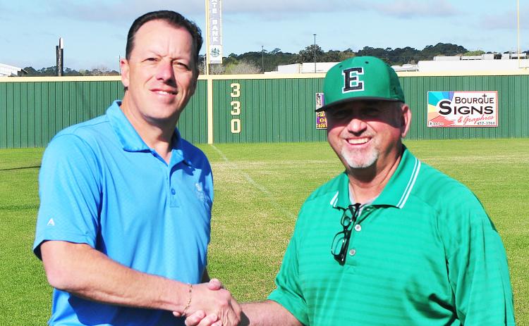 Washington State Bank’s Kip Bertrand joins Eunice High head coach Scott Phillips prior to the annual baseball tournment.