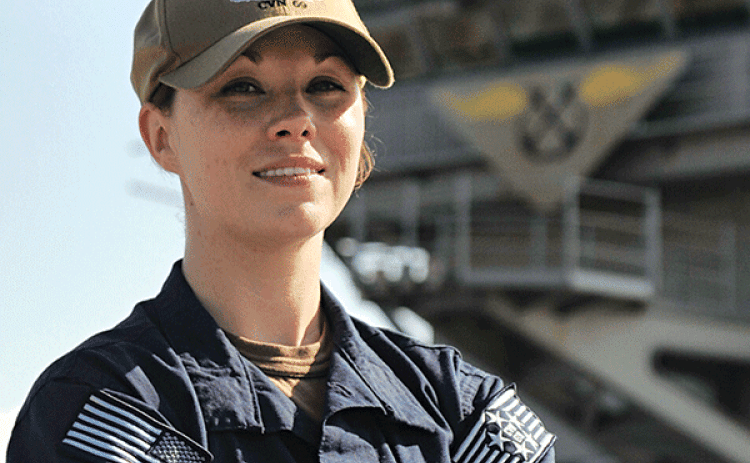 Petty Officer 2nd Class Mandi Daigle, a native of Church Point,  is one of more than 5,000 sailors serving aboard the self-contained mobile airport, USS Dwight D. Eisenhower. Daigle attended Church Point High School. (Photo by Mass Communication Specialist 3rd Class Jerome Fjeld, Navy Office of Community Outreach)