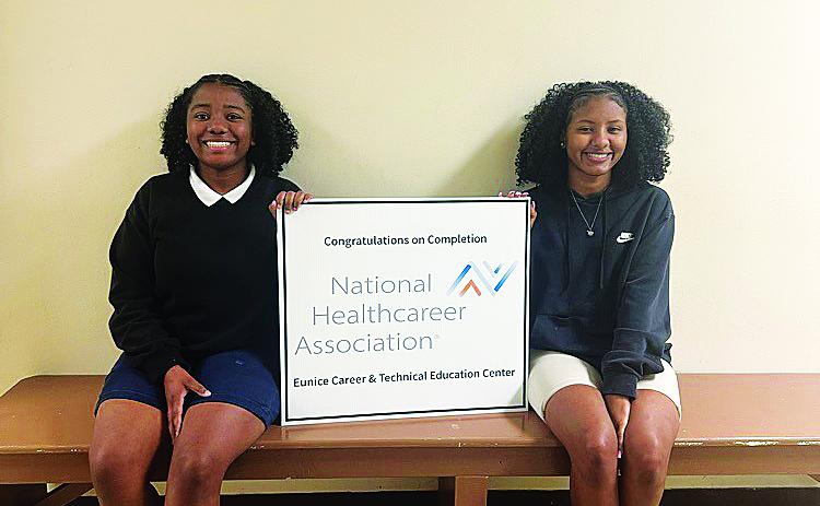 Eunice Career and Technical Education Center students (from left) Karlie Riggs and Ijah Mitchell recently achieved their Patient Care Technician certification from the National Healthcare Association.