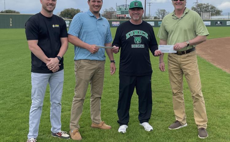From left are Stefan Frey, Cole Frey, Eunice High head baseball coach Scott Phillips and Randy Young.