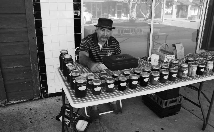 Farmers Market participant and his goods
