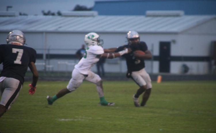 Eunice linebacker Zyon Fontenot attempts to drag down a Northwest ball carrier during Friday's 21-14 loss.