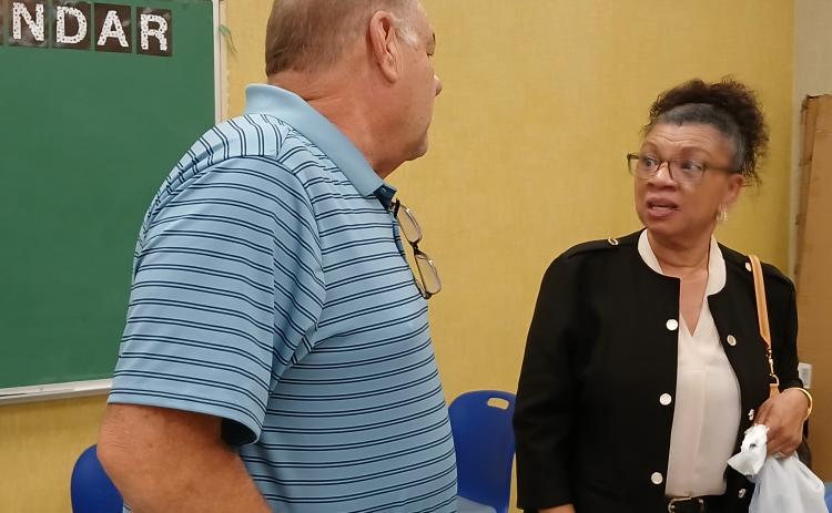 Kyle Boss and Lucretia Hertzock after board meeting