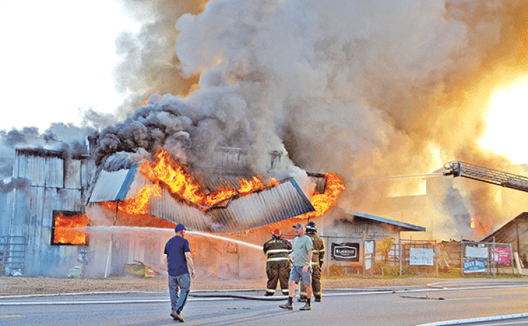 Landry’s Feed Store, an institution in Rayne for over 70 years, was destroyed by fire Thursday morning. Units from Rayne, Branch, Mire, Scott and Crowley responded to the blaze. Dan Landry, who owns the business with his brother Kenneth, was recently honored by Purina as a dealer of the animal nutrition product for 70 years. The building had stood in the 600 block of East Texas Avenue for the past 60 years after it was moved from its original location at 801 S. Polk St. “People have been asking me for years