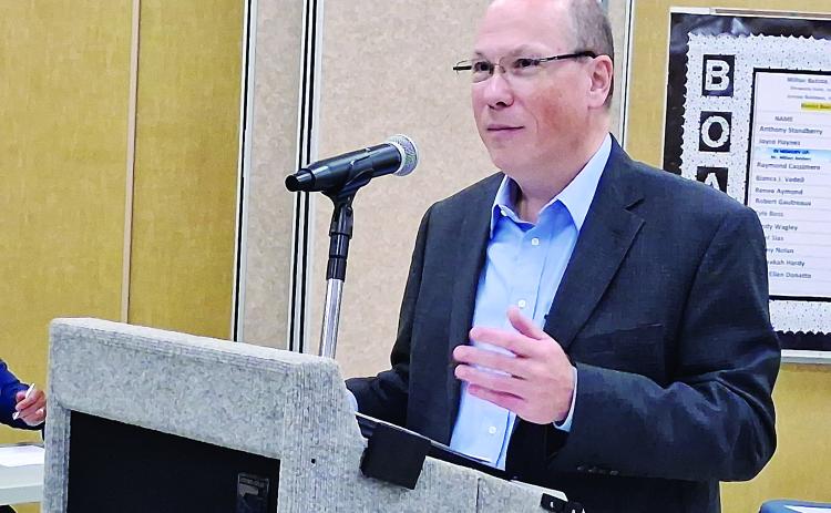 John Mayeaux explains details of the bond purchase with St. Landry Parish School Board members