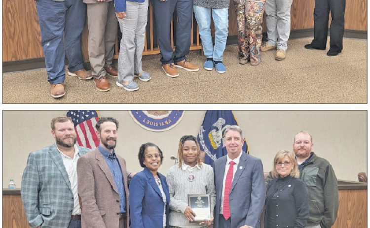 Two locals were honored by the Eunice mayor and board of aldermen and alderwomen for their service in the Eunice community. (Above) Pictured, from left, are Stan Feucht, City of Eunice attorney, Alderman Chad Andrepont, Alderwoman Germaine Simpson, Mayor Scott Fontenot, Elizabeth Reed Guillory, recipient of the Municipal Service Award, her granddaughter, Erika Godfrey, Alderman “Randy” Reed and Alderwoman Connie Thibodeaux. (Below) The mayor and board of alderman with Detrell Thomas, Community Service and A