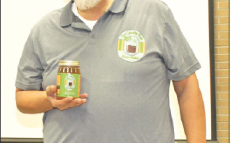 Dwight Broussard of Two Country Boys from Mallet Manglier Tea was the guest speaker Wednesday at the Eunice Rotary Club meeting. (Photo by Myra Miller)