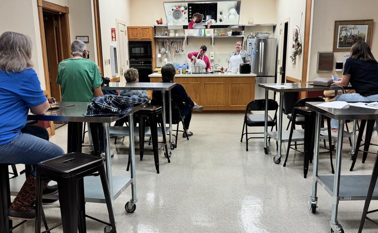 Audience at Jean Lafitte Center watching cooking class. (Photos by Rebecca Chaisson)