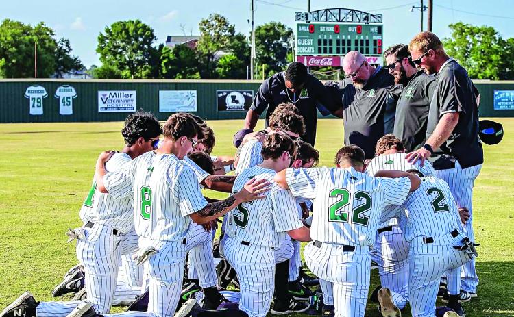 Prayer led before the Eunice High Bobcats game. (Photo by Dwight Jodon)