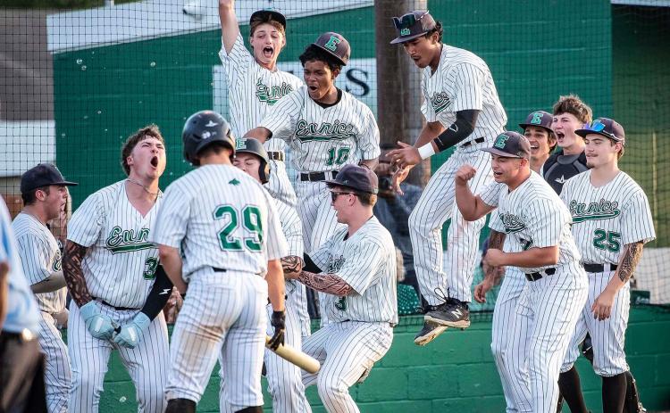 Eunice High team celebrates a playoff victory Thursday evening in their home contest. (Photo by Dwight Jodon)