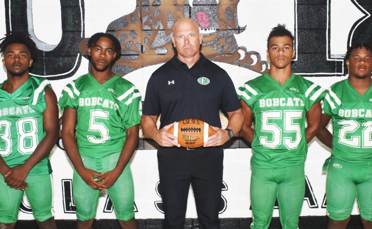 Eunice High defensive coordinator Dale Guillory, center, is joined by Paul Edwards, Jared Thomas, Jonathon McQuirter and Lathan Kennedy.