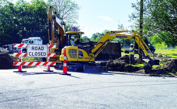 Contract workers on LA. 13 replacing cross drain. (Photo by Misty Gilley)